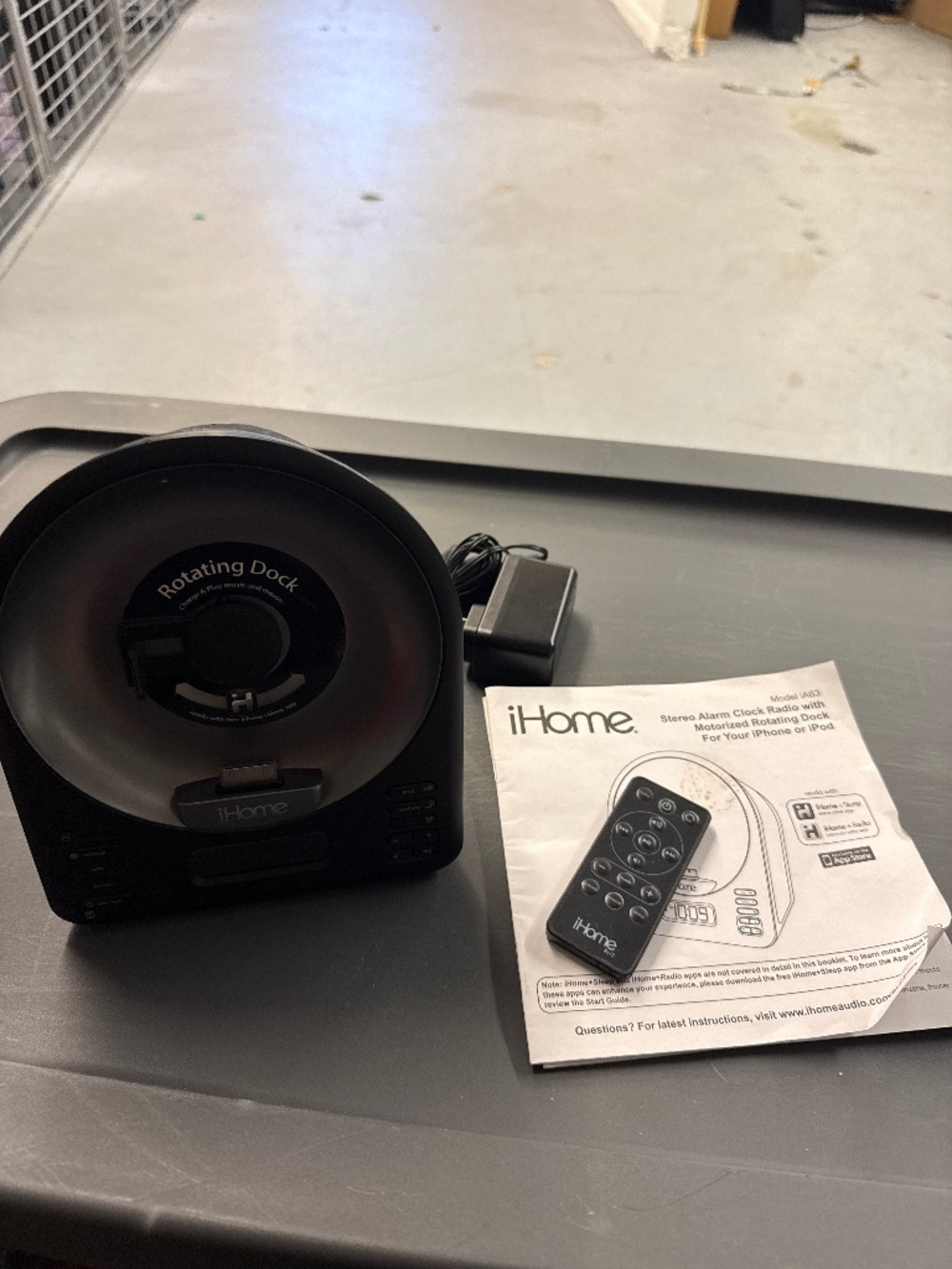 I home - stereo alarm clock radio with motorized rotating dock for your iPhone